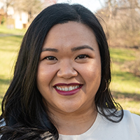 Portrait image of Elaine de Leon smiling