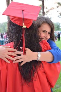 Itza and her attorney at her high school graduation.