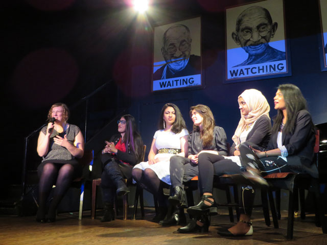 Heather Heiman of Tahirih Justice Center moderates a Q&A session with Pomegranate Tree Group at Busboys and Poets in Washington, DC.