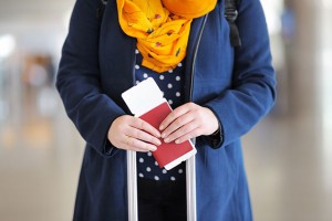Woman-Holding-Passport_640