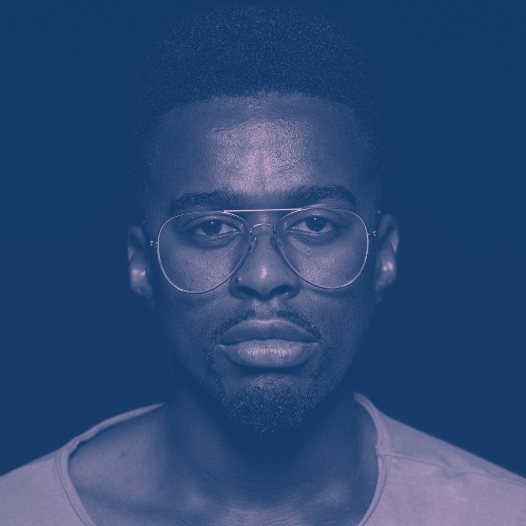 Las caras del asilo: 13 Portrait of an individual with glasses and, showing an expression of frustration